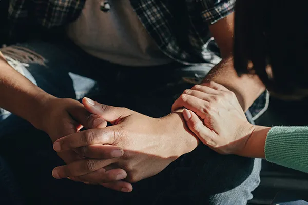 woman consoling a man